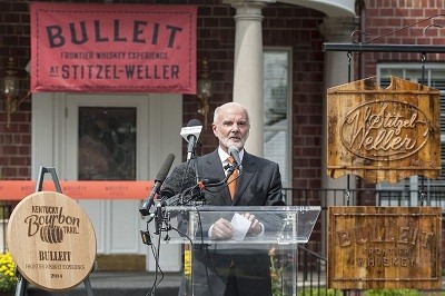Bulleit Bourbon Founder Tom Bulleit speaks at the ribbon-cutting event for the Bulleit Frontier Whiskey Experience at Stitzel-Weller