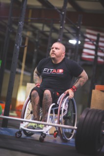 Michael Mills in the FitAID custom wheelchair (PRNewsFoto/LifeAID Beverage Company)